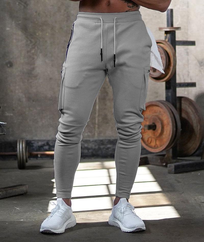Spodnie sportowe męskie elastyczne - joggery do ćwiczeń z kieszeniami